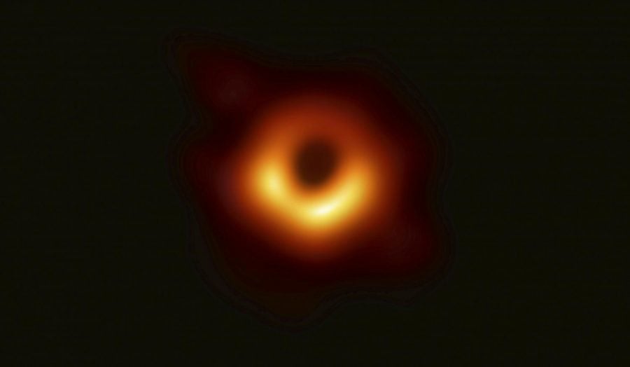 This image released Wednesday, April 10, 2019, by the Event Horizon Telescope project, shows a black hole at the center of the M87 galaxy. 