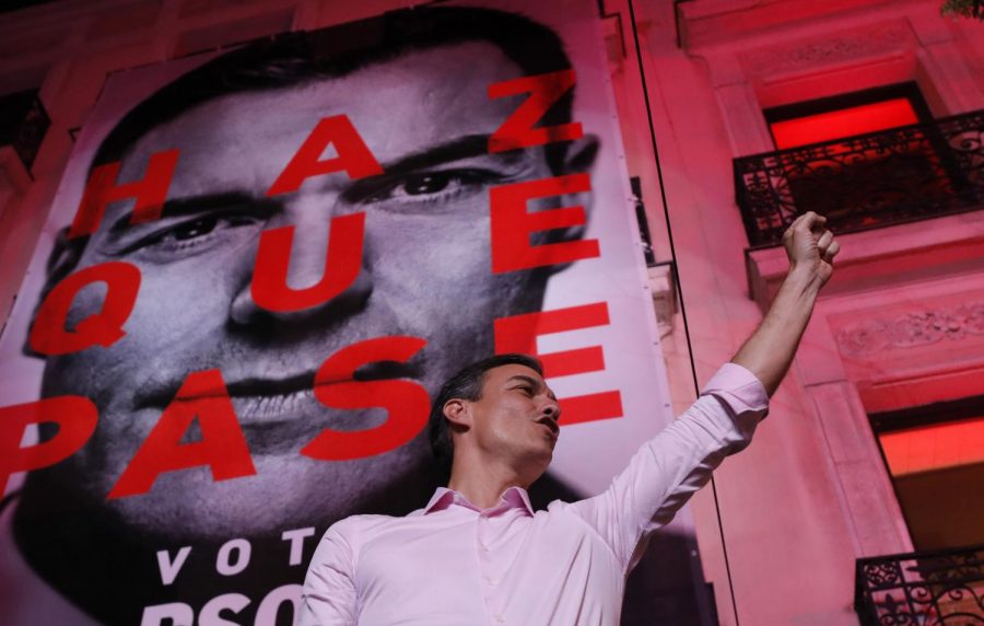 Spains Prime Minister and Socialist Party leader Pedro Sanchez gestures to supporters outside the party headquarters following the general election in Madrid, Spain, Sunday, April 28, 2019. A divided Spain voted Sunday in its third general election in four years, with all eyes on whether a far-right party will enter Parliament for the first time in decades and potentially help unseat the Socialist government.
