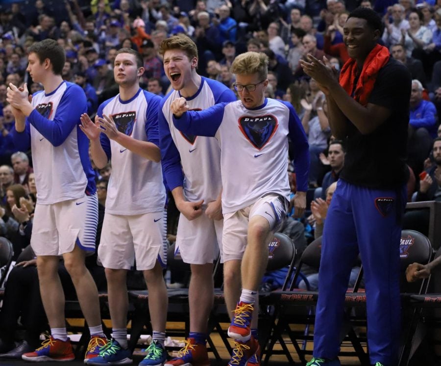 (Left to right) George Maslennikov, John Diener, Mick Sullivan, Pantelis Xidias and Jalen Coleman-Lands react to a play during DePaul’s victory over USF Wednesday night at McGrath-Phillips Arena. The Blue Demons won the game 100-96. Alexa Sandler | The DePaulia