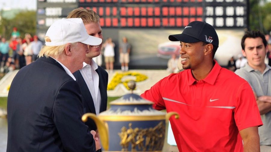March 10, 2013; Miami,  FL, USA; Tiger Woods is congratulated by Donald Trump for his victory at the WGC Cadillac Championship at Trump Doral Golf Club.  