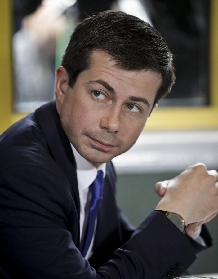Pete+Buttigieg+listens+during+a+lunch+meeting+in+Harlem+with+civil+rights+leader+Rev.+Al+Sharpton