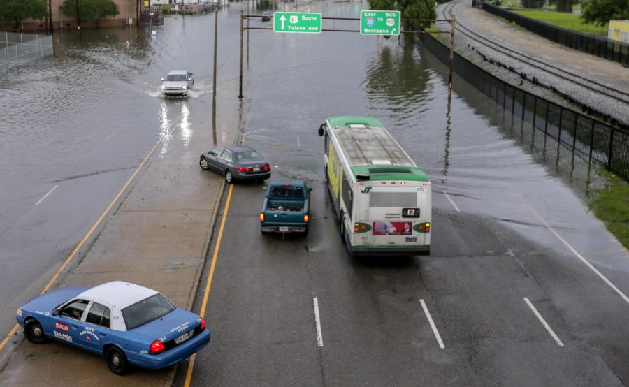 Parts of Airline Highway is covered with water in New Orleans Sunday, May 12, 2019. New Orleans residents awoke to flooded streets Sunday and the Mississippi Highway Patrol closed part of a highway due to heavy rains that also may have contributed to a freight train derailment.