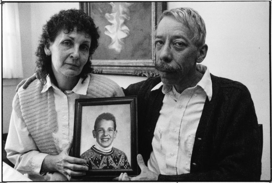 In this Jan. 7, 1992 photo, Esther and Allan Chereck, parents of slain David Chereck, hold a photo of their son during an interview at their home in Skokie, Ill. on Jan. 7, 1992. Eduardo Contreras, Robert Serritella was found guilty Thursday, May 23, 2019 of first-degree murder in the 1992 death of 15-year-old David Chereck. Serritella, 76, of Park Ridge, was charged in 2014 in the decades-old cold case. Chereck was found strangled with his own scarf in a Morton Grove forest preserve.