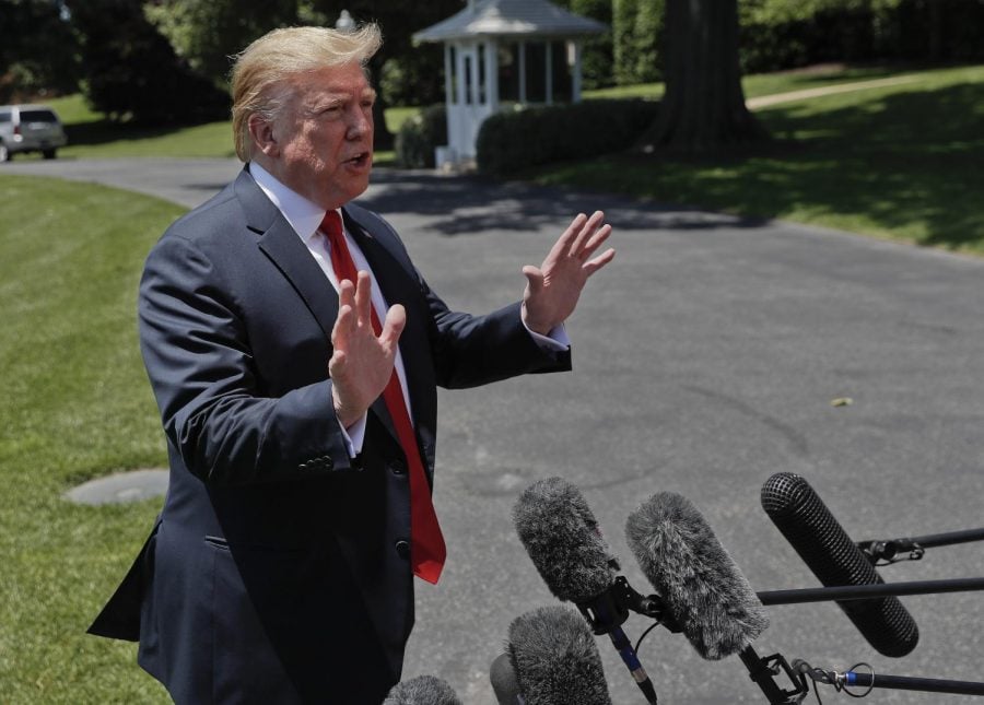 President Donald Trump speaks to members of the media on the South Lawn of the White House in Washington, Friday, May 24, 2019, before boarding Marine One for a short trip to Andrews Air Force Base, Md., and then on to Tokyo.