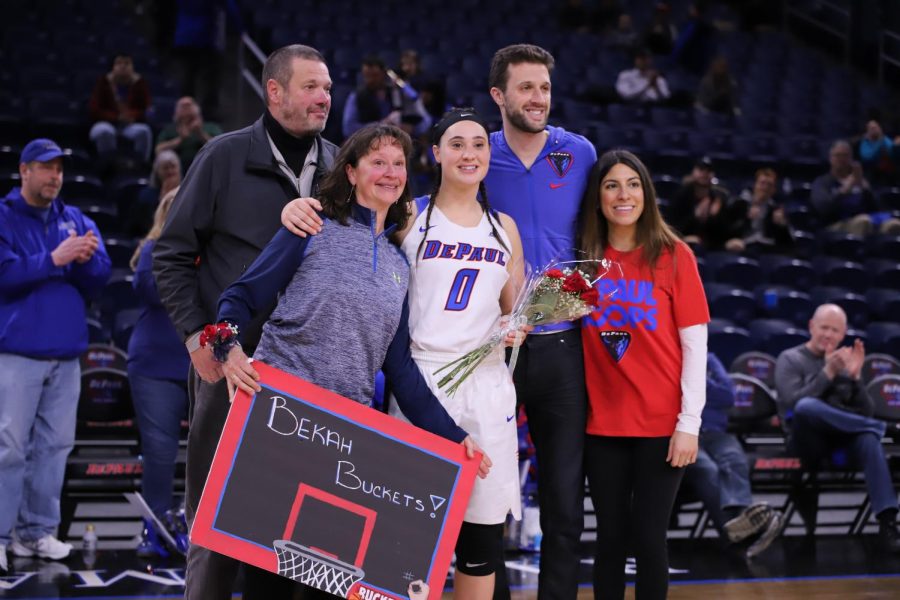 Graduate senior Rebekah Dahlman celebrates with family.