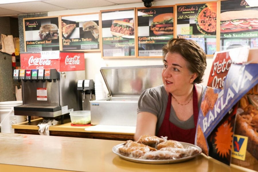 Branko’s sandwich shop owner Anja Branko, known to regular customers as “Mama,” staffs the counter at her sandwich shop across from the DePaul’s Lincoln Park campus quad on Fullerton Avenue. 