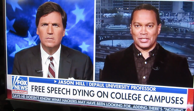 Jason Hill appearing on Tucker Carlsons Fox News show in 2018.