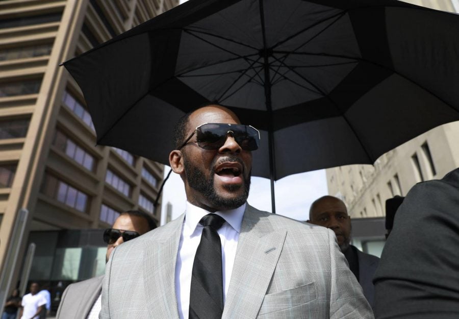 Musician R. Kelly departs the Leighton Criminal Court building after pleading not guilty to 11 additional sex-related charges, Thursday, June 6, 2019, in Chicago.