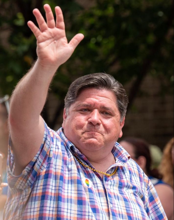 Governor+J.B.+Pritzker+waves+to+the+crowd+as+he+participates+in+Sundays+pride+parade.