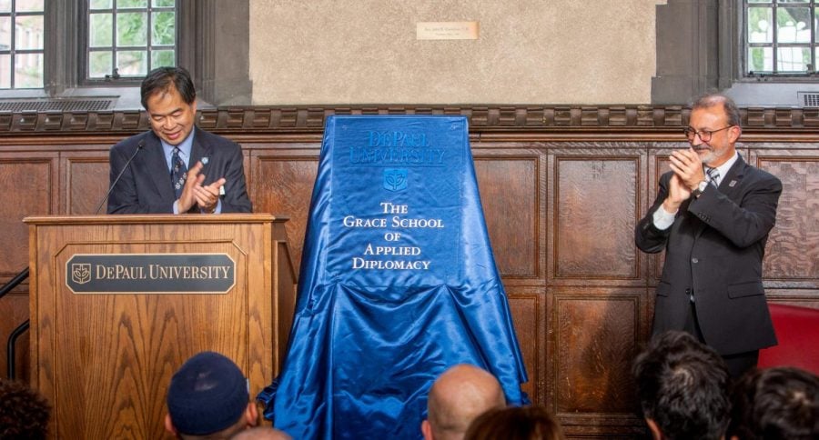  A. Gabriel Esteban, Ph.D., president of DePaul, left and Guillermo Vásquez de Velasco, dean of the College of Liberal Arts and Social Sciences, right.