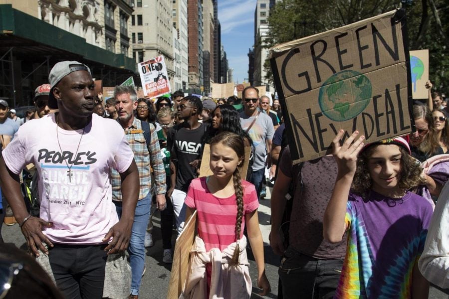 Swedish environmental activist Greta Thunberg, center, takes part during the Climate Strike, Friday, Sept. 20, 2019 in New York.  Rallies calling for action on climate change are happening in cities around the world Friday ahead of a summit on the issue. 