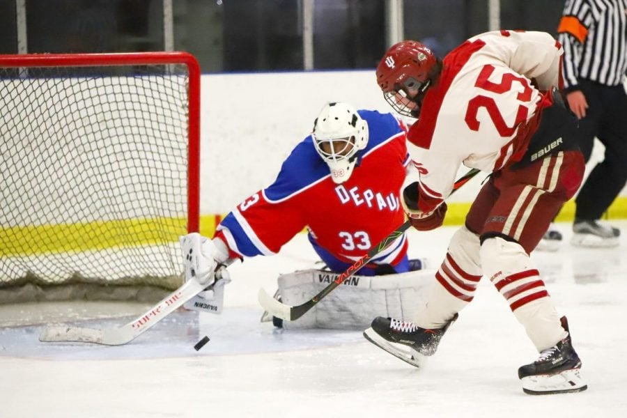 DePaul club hockey goalie Rodolfo Hodgson Jr. makes a save during the game on Friday at Johnny’s Ice House West.
