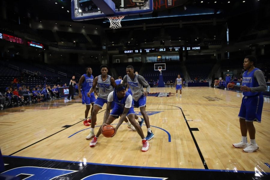 DePaul sophomore forward Darious Hall comes down with a rebound in the Blue Demons’ open scrimmage on Saturday.