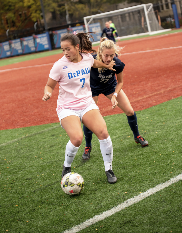 Kristin Boos defends the ball against a Georgetown defender in a game on Oct. 24 in a contest at Wish Field. Boos has three goals and three assists on the season. 