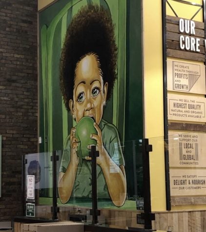 A mural painted on the wall of the Englewood Whole Foods (Photo by: Hannah Mitchell, Oct. 17, 2019)