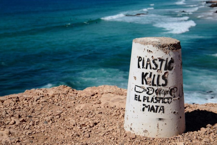 This April 6, 2018 photo shows an anti-pollution message in Fuerteventura, the second-largest of the seven Canary Islands. Experts say chemical pollution from farming and industrial runoff poses an even greater threat than plastics.