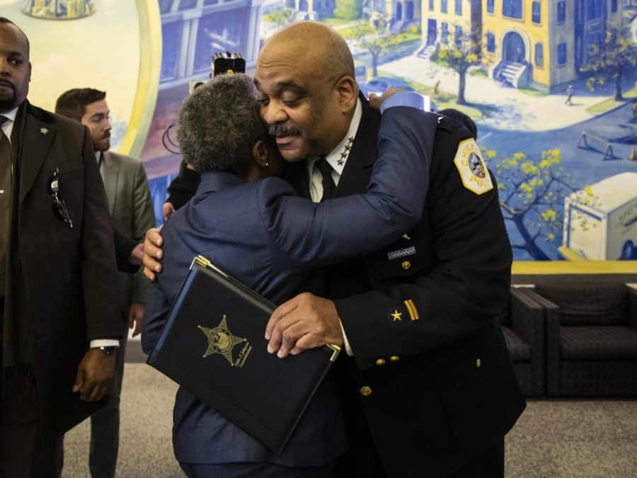 Chicago Police Department Supt. Eddie Johnson hugs Mayor Lori Lightfoot after he announced his retirement during a press conference at CPD headquarters, Thursday morning, Nov. 7, 2019.