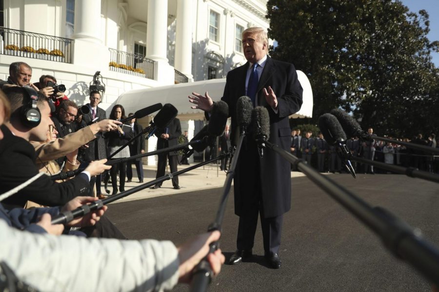 President Donald Trump speaks to reporters on the South Lawn of the White House in Washington, Friday, Nov. 8, 2019, before boarding Marine One for a short trip to Andrews Air Force Base, Md. and then on to Georgia to meet with supporters.