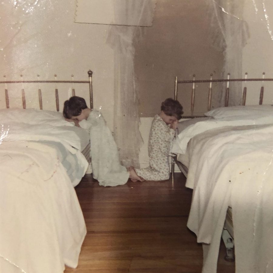 This October 1968 family photo shows Katie Bowman as a child, right, in her room in Waterloo, Iowa. Bowman’s parents welcomed into their religious home three priests who molested her, she said, starting when she was around 4, a few months after this photo was made.