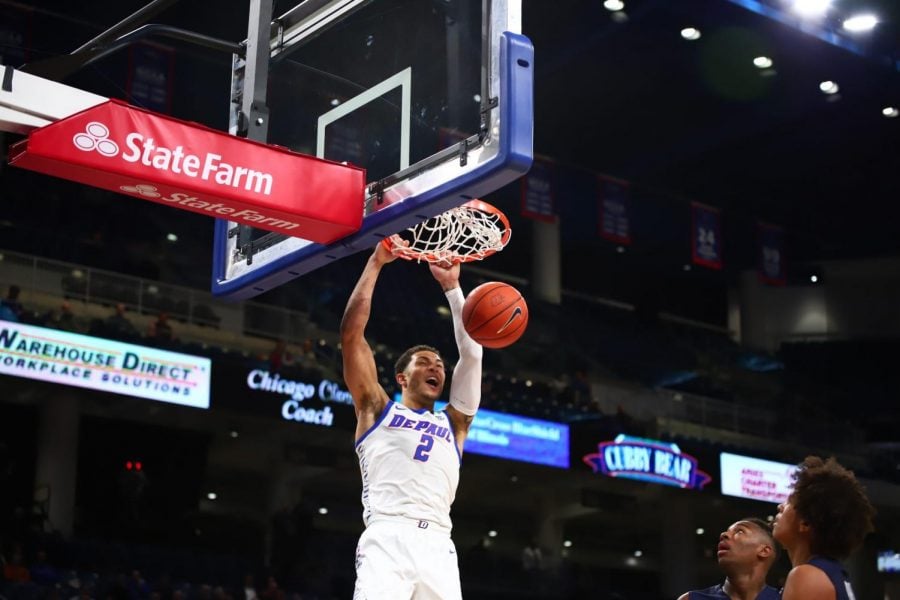 DePaul junior forward Jaylen Butz dunks the ball against Fairleigh Dickinson on Friday at Wintrust Arena 