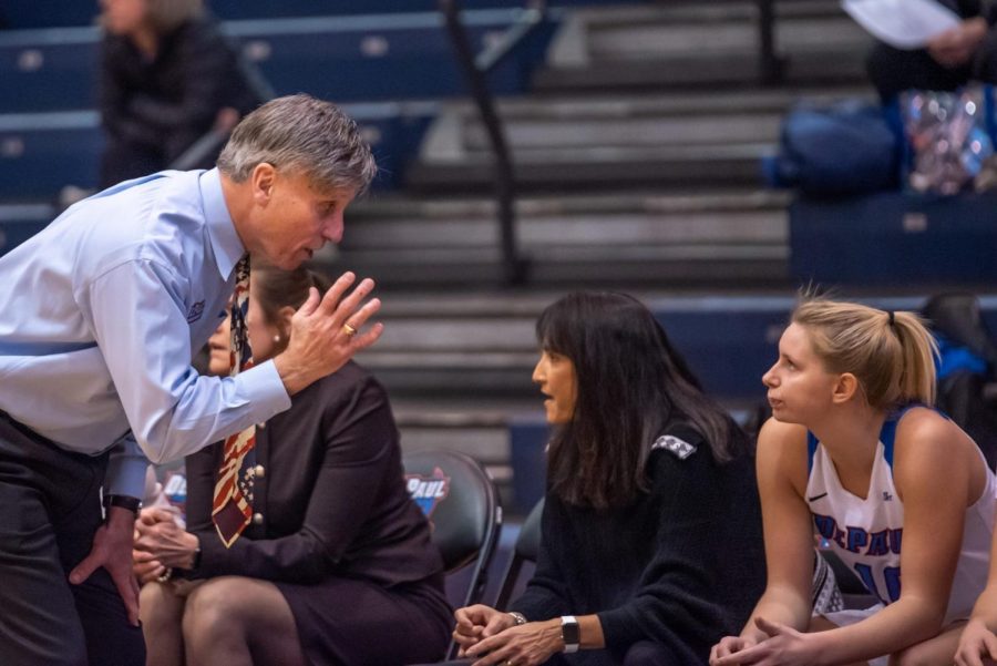 Head coach Doug Bruno talking to sophomore guard Lexi Held on the sideline of Monday nights win over Drexel at McGrath-Phillips Arena.