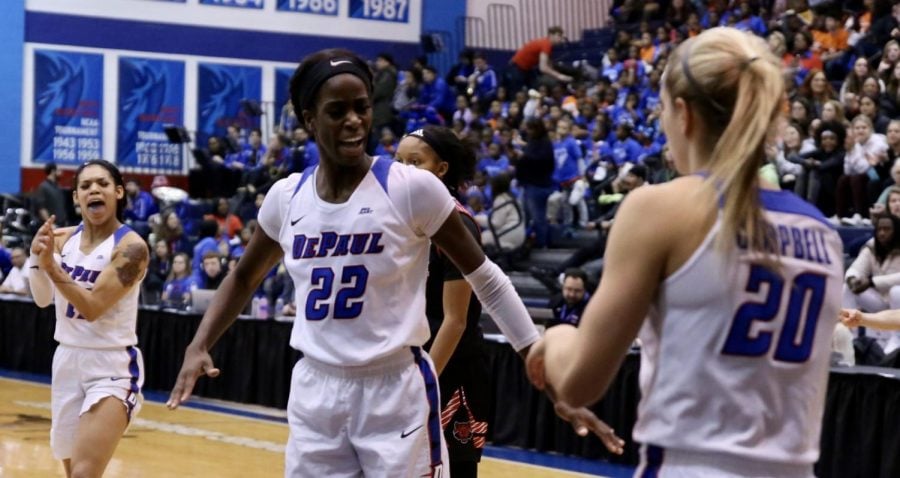 Chante Stonewall celebrates with fellow senior Kelly Campbell in a game against Miami on Nov. 23.