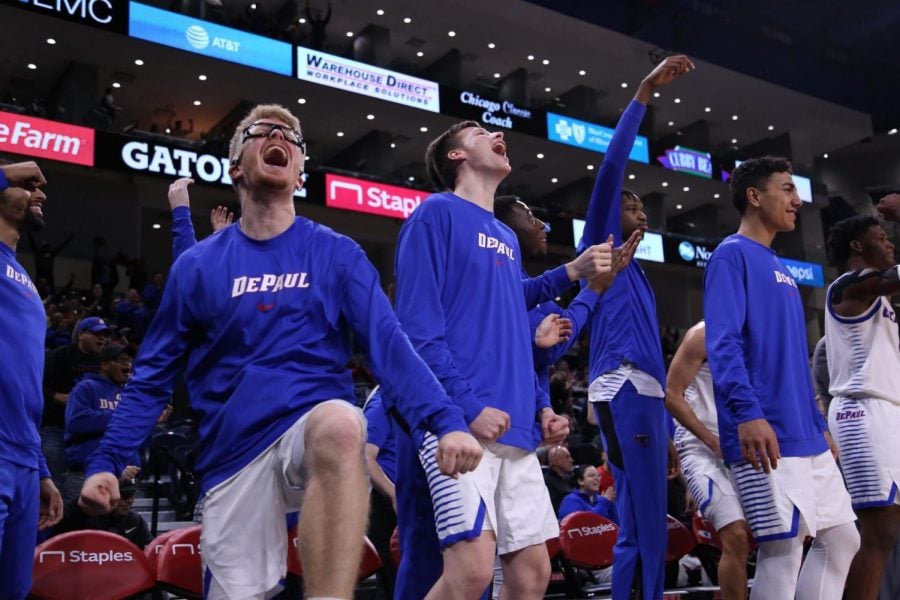 The bench celebrates during the second half of a game against Central Michigan on Tuesday, Nov. 26.