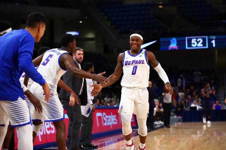 DePaul freshman guard Markese Jacobs celebrates with the bench in the second half against Fairleigh Dickinson at Wintrust Arena. 