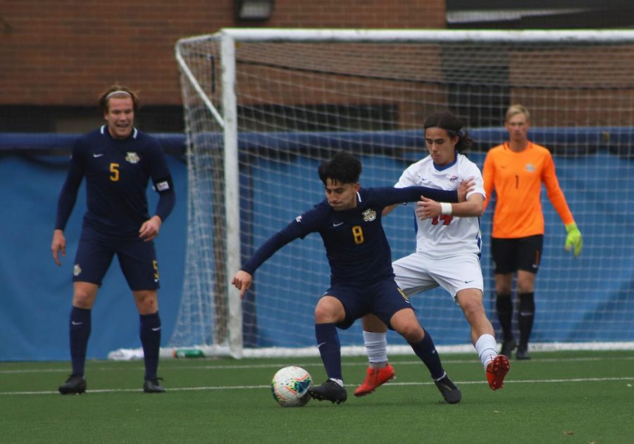 DePaul's Jacob Seeto defending a Marquette forward during a 1-0 loss at Wish Field on Nov. 16, 2019.