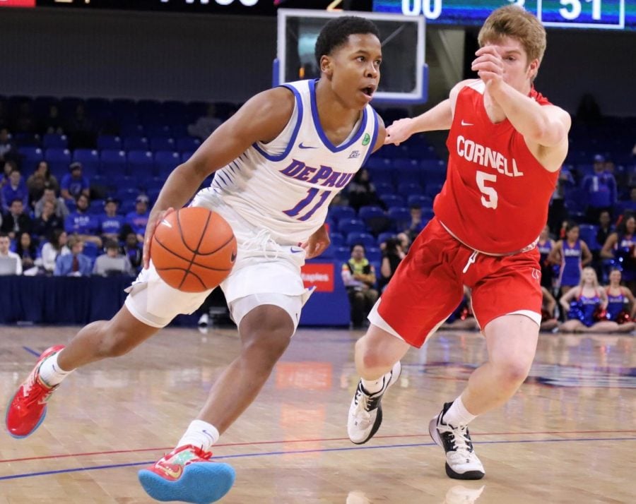 DePaul junior guard Charlie Moore drives to the basket in the second half against Cornell at Wintrust Arena