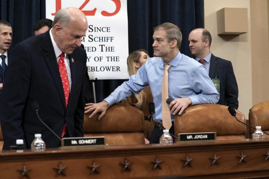 Rep. Louie Gohmert, R-Texas, left, and Rep. Jim Jordan, R-Ohio, arrive for the vote on two articles of impeachment against President Donald Trump, Friday, Dec. 13, 2019, on Capitol Hill in Washington.