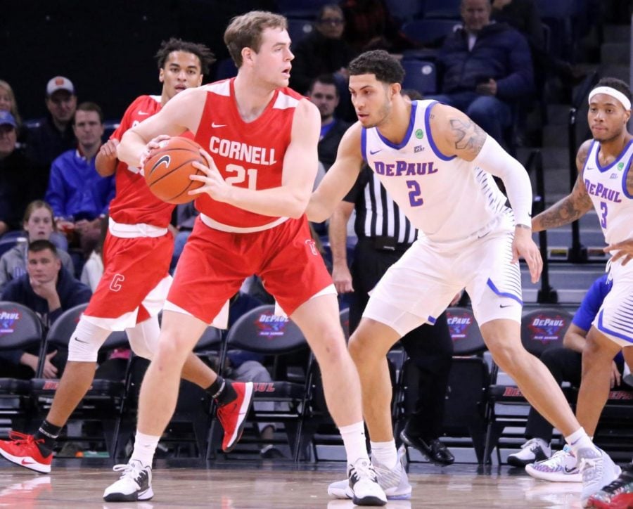 DePaul junior forward Jaylen Butz defends a Cornell player on Nov. 16 a Wintrust Arena. 