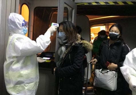Chinese city stops outbound flights, trains to fight virus