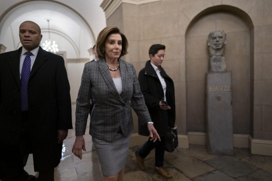 Speaker of the House Nancy Pelosi, D-Calif., arrives as defense arguments by the Republicans resume in the Senate impeachment trial of President Donald Trump on charges of abuse of power and obstruction of Congress, at the Capitol in Washington, Monday, Jan. 27, 2020. 