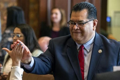 In this June 2, 2019 file photo Illinois State Sen. Martin Sandoval, D-Chicago, at the Illinois State Capitol, in Springfield, Ill. Sandoval was charged in federal court Monday, Jan. 27, 2020, with bribery and filing a false tax return stemming from his support of the red-light camera industry when he was head of the state's powerful Transportation Committee.