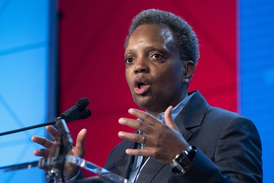 In this Jan. 23, 2020, file photo, Chicago Mayor Lori Lightfoot​, speaks at the ​U.S. Conference of Mayors Winter Meeting in Washington. Underprivileged areas in Chicago will receive an estimated $20 million investment for revitalization efforts that prioritize affordable housing and economic development, Lightfoot and Illinois Gov. J.B. Pritzker announced Monday, Jan. 27.