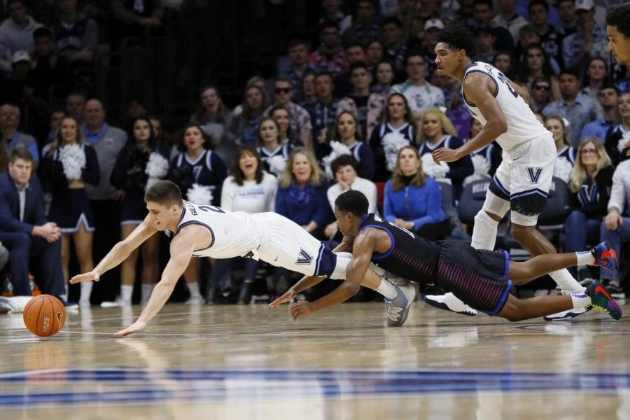 Villanovas+Collin+Gillespie+dives+for+a+loose+ball+with+DePauls+Charlie+Moore+during+the+second+half+in+their+game+on+Tuesday+night+in+Villanova%2C+Pa.+Villanova+won+79-75+in+overtime.