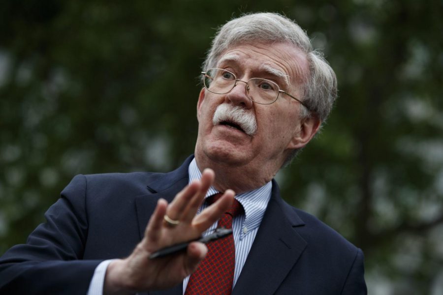 In this May 1, 2019 file photo, National security adviser John Bolton talks to reporters outside the White House in Washington.