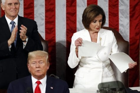 House Speaker Nancy Pelosi of Calif., tears her copy of President Donald Trump's s State of the Union address after he delivered it to a joint session of Congress on Capitol Hill in Washington, Tuesday, Feb. 4, 2020. Vice President Mike Pence is at left.