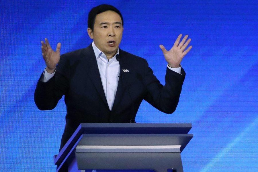 In this Feb. 7, 2020, photo, Democratic presidential candidate entrepreneur Andrew Yang speaks during a Democratic presidential primary debate at Saint Anselm College in Manchester, N.H.