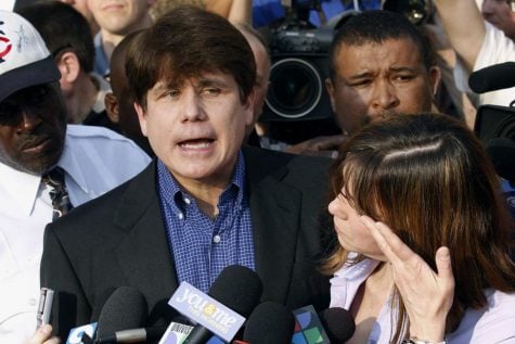 In this March 14, 2012, file photo, former Illinois Gov. Rod Blagojevich speaks to the media outside his home in Chicago as his wife, Patti, wipes away tears a day before reporting to prison after his conviction on corruption charges. President Donald Trump is expected to commute the 14-year prison sentence of Blagojevich. The 63-year-old Democrat is expected to walk out of prison later Tuesday, Feb. 18, 2020.