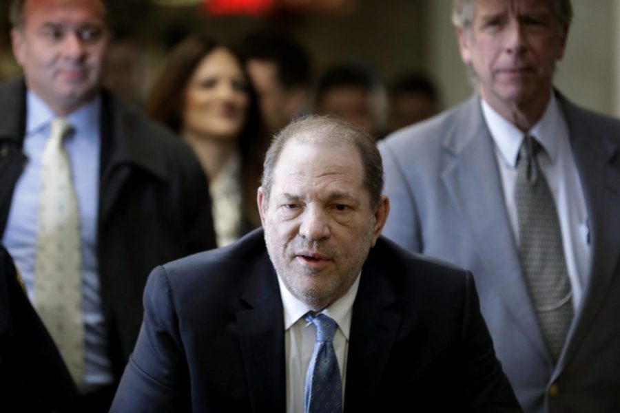 FILE-Harvey Weinstein arrives at a Manhattan courthouse as jury deliberations continue in his rape trial, Monday, Feb. 24, 2020, in New York.