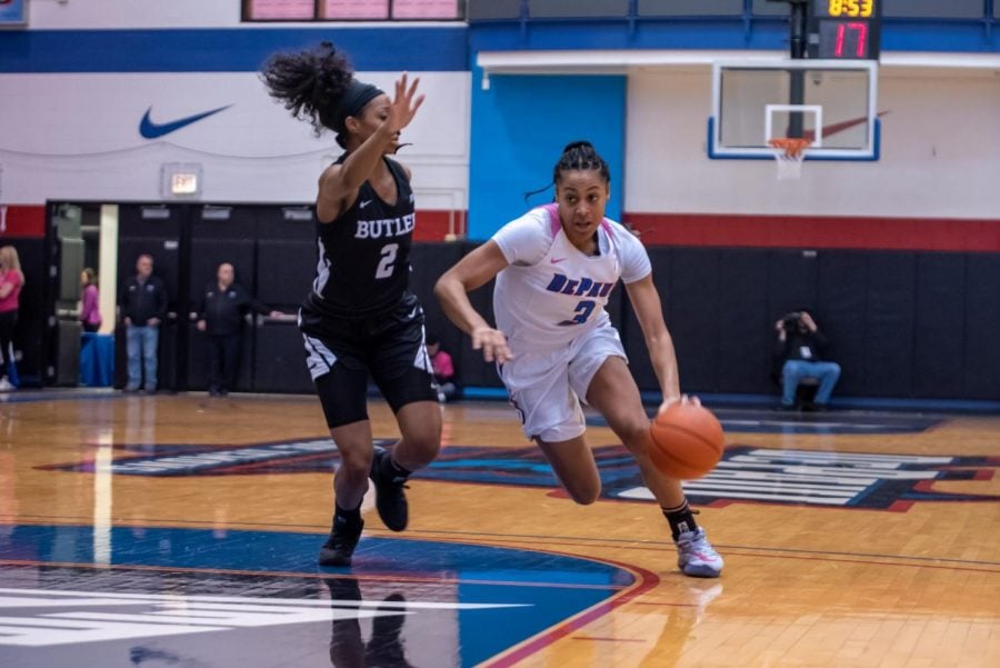 DePaul junior guard Deja Church drives past a Butler defender in the first half on Friday at McGrath-Phillips Arena. Church finished the game with 19 points. 