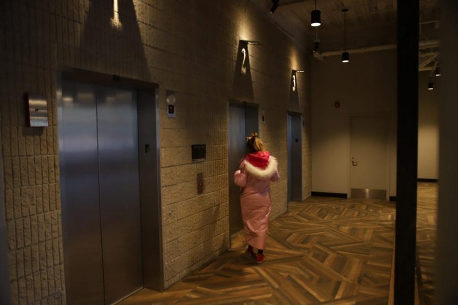 A resident waits for an elevator at Ion Lincoln Park.