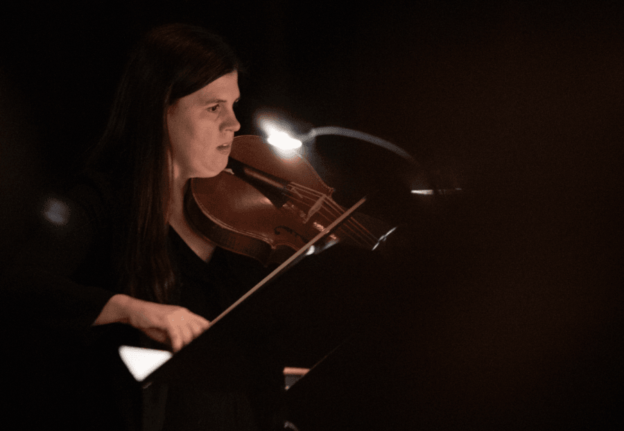 Brandi Berry Benson, a violin professor at DePaul, playing music inpsired by Isabelle d’Este. In this image, she is playing viola at The Newberry Consort.