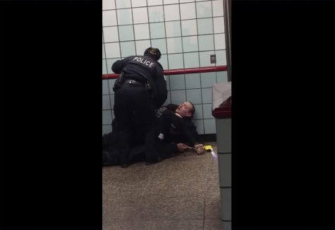 This Friday, Feb. 28, 2020 image from cellphone video shows Chicago police officers trying to apprehend a suspect inside a downtown Chicago train station. After a struggle with police, the suspect was shot as he fled up the escalator with the officers in pursuit. Mayor Lori Lightfoot said video footage of police shooting and wounding the suspect is “extremely disturbing” and that she supports the interim police superintendent's request for prosecutors to be sent directly to the scene.