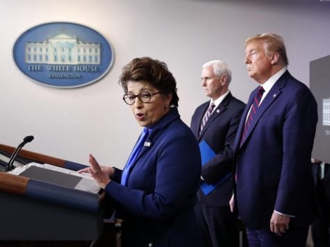 In this Thursday, April 2, 2020 file photo, Jovita Carranza, administrator of the Small Business Administration, speaks about the coronavirus in the James Brady Press Briefing Room of the White House n Washington, as Vice President Mike Pence, President Donald Trump listen. Millions of small businesses are expected to apply for a desperately needed rescue loan Friday, a stern test for a banking industry that has had less than a week to prepare for the deluge. Small businesses will be seeking loans from the $349 billion Paycheck Protection Program, which was put in place to help them retain workers and pay bills during the coronavirus pandemic.