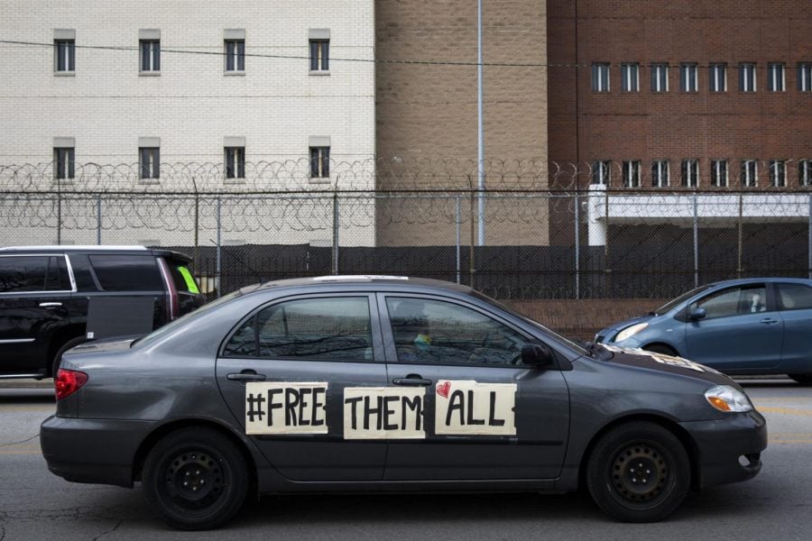 In this April 7, 2020 file photo, amid fears of the coronavirus pandemic, dozens of protesters drive around Cook County Jail and the Leighton Criminal Courthouse in Chicago, honking their horns and chanting to demand the mass release of detainees at the jail. A federal judge has ordered Cook County Jail on Thursday, April, 9, 2020, to take steps to protect inmates from coronavirus.