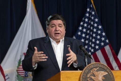 In this April 13, 2020 file photo, Illinois Gov. J.B. Pritzker gives a daily state update on the coronavirus outbreak in Chicago. Seven Midwestern governors announced Thursday, April 16, 2020 that they will coordinate on reopening their state economies amid the coronavirus pandemic, after similar pacts were made in the Northeast and on the West Coast. The latest agreement includes Illinois, Ohio, Michigan, Indiana, Wisconsin, Minnesota and Kentucky.