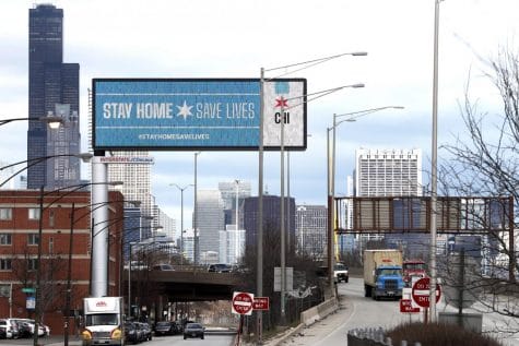 In this March 30, 2020, file photo, a public service message reminding people to Stay Home Save Lives is seen on a billboard near the Dan Ryan Expressway in Chicago. Illinois Gov. J.B. Pritzker on Thursday, April 23, 2020 extended his stay-at-home order through May 30 as the highly contagious COVID-19 continues its rounds. Pritzker's first decree was to expire April 30.